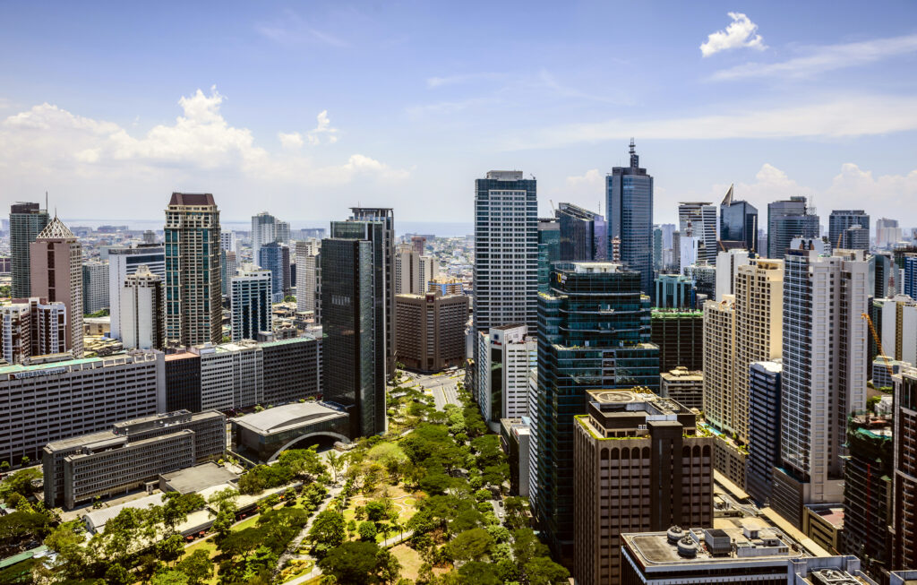 Manila cityscape under blue sky, Philippines